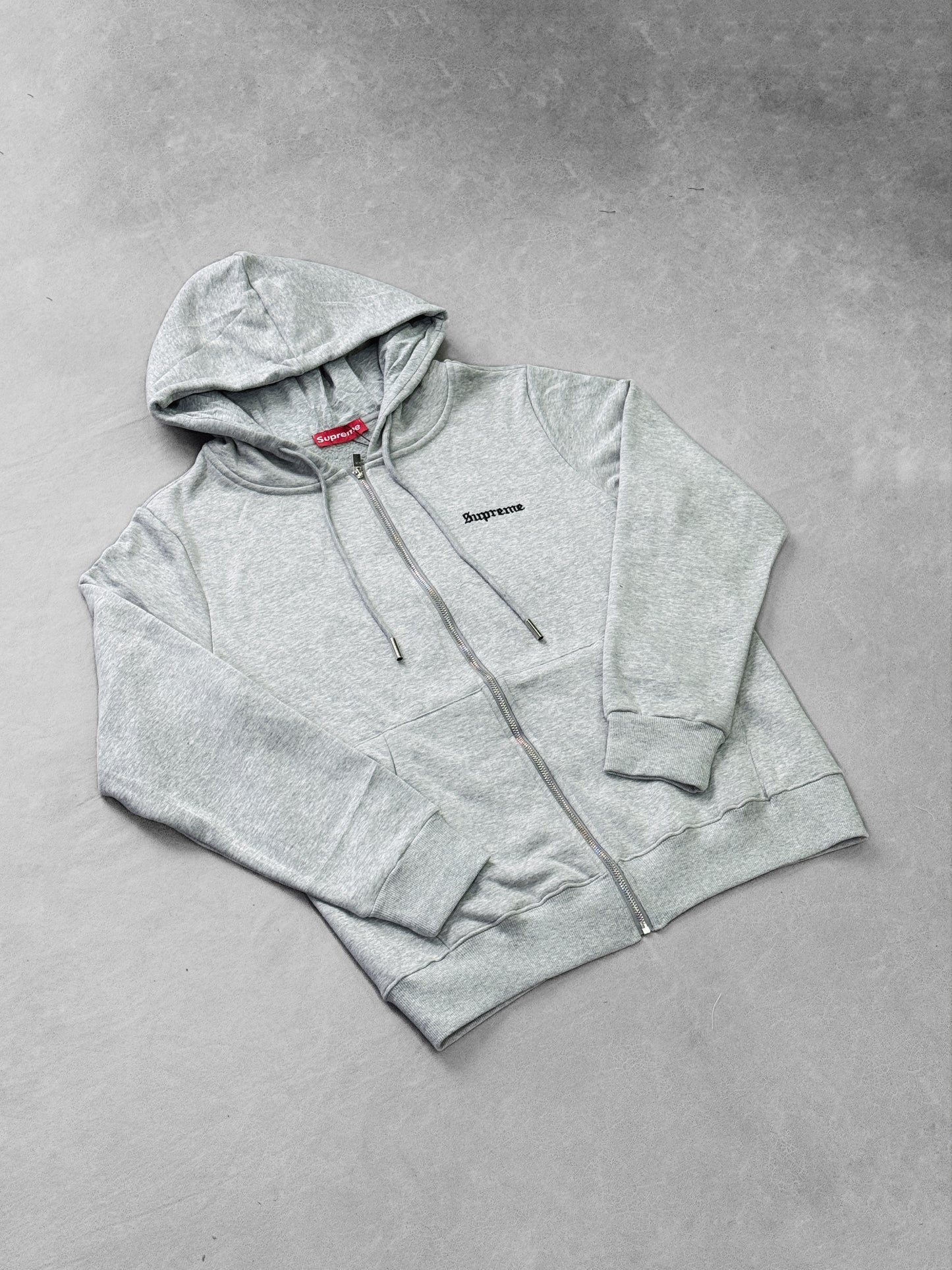 SUPREME GRIS CIERRE