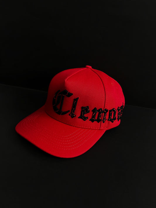 CLEMONT ROJA LETRAS AL LADO NEGRA RAYAS