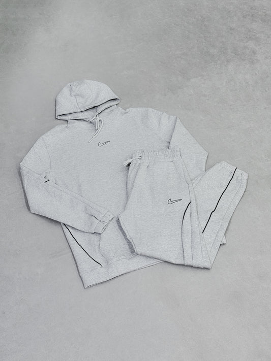 NIKE 1 GRIS SPORTWEAR