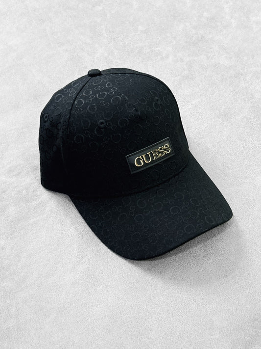 GUESS EMBLEMA DORADO