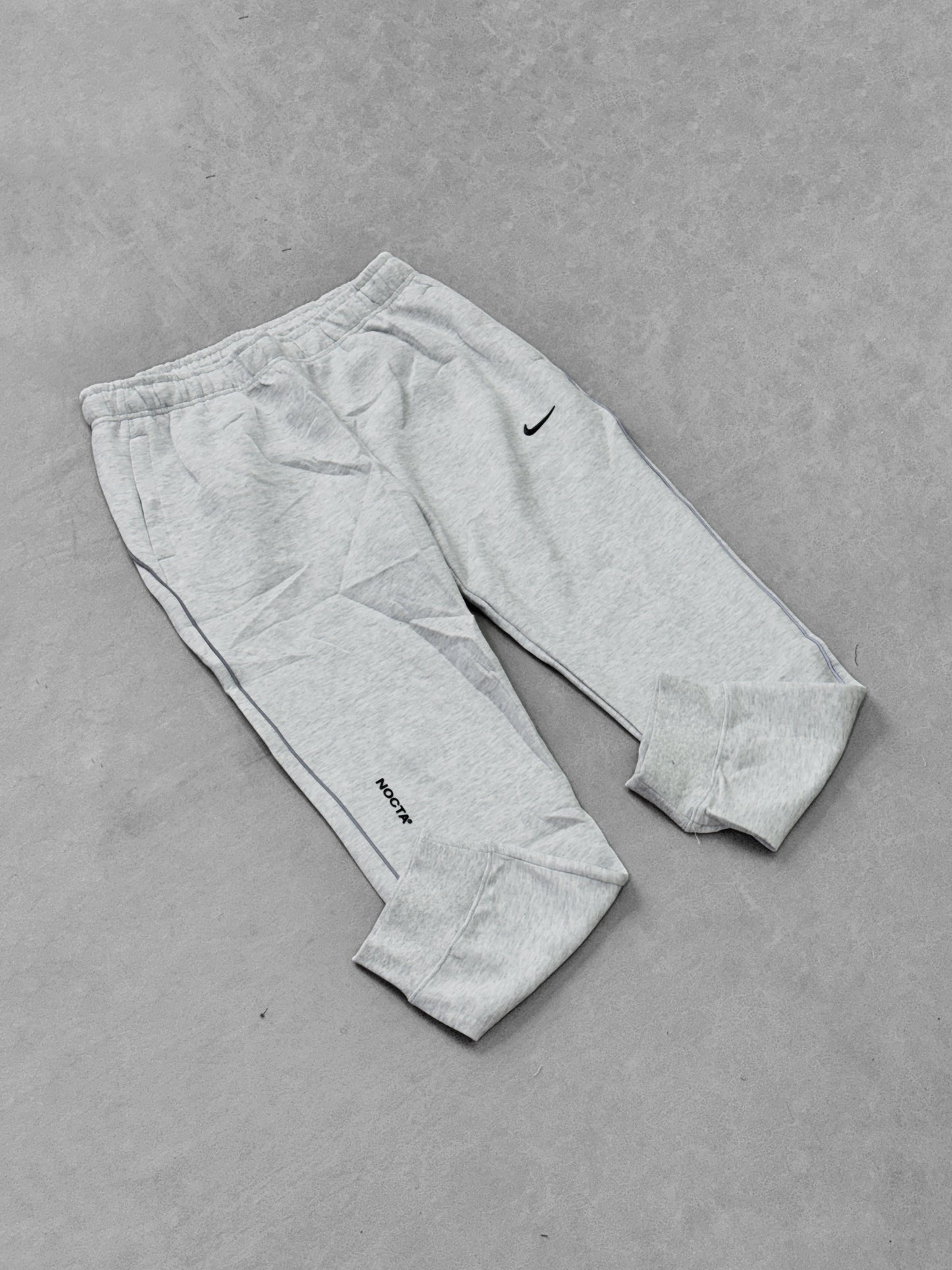 NIKE NOCTA GRIS